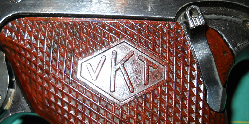 detail, L-35 left grip panel, VKT in diamond marking, plus safety lever